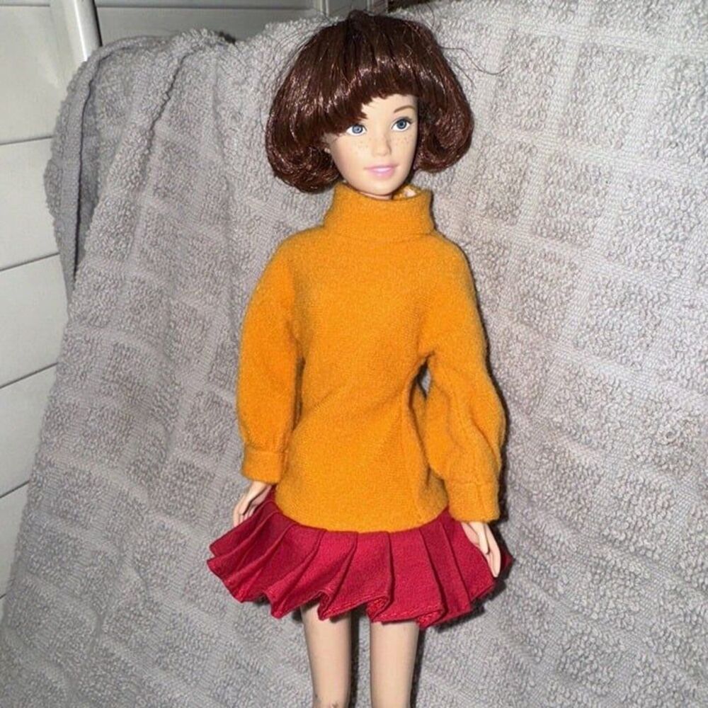 Mattel Doll with Orange Sweater and Red Skirt
